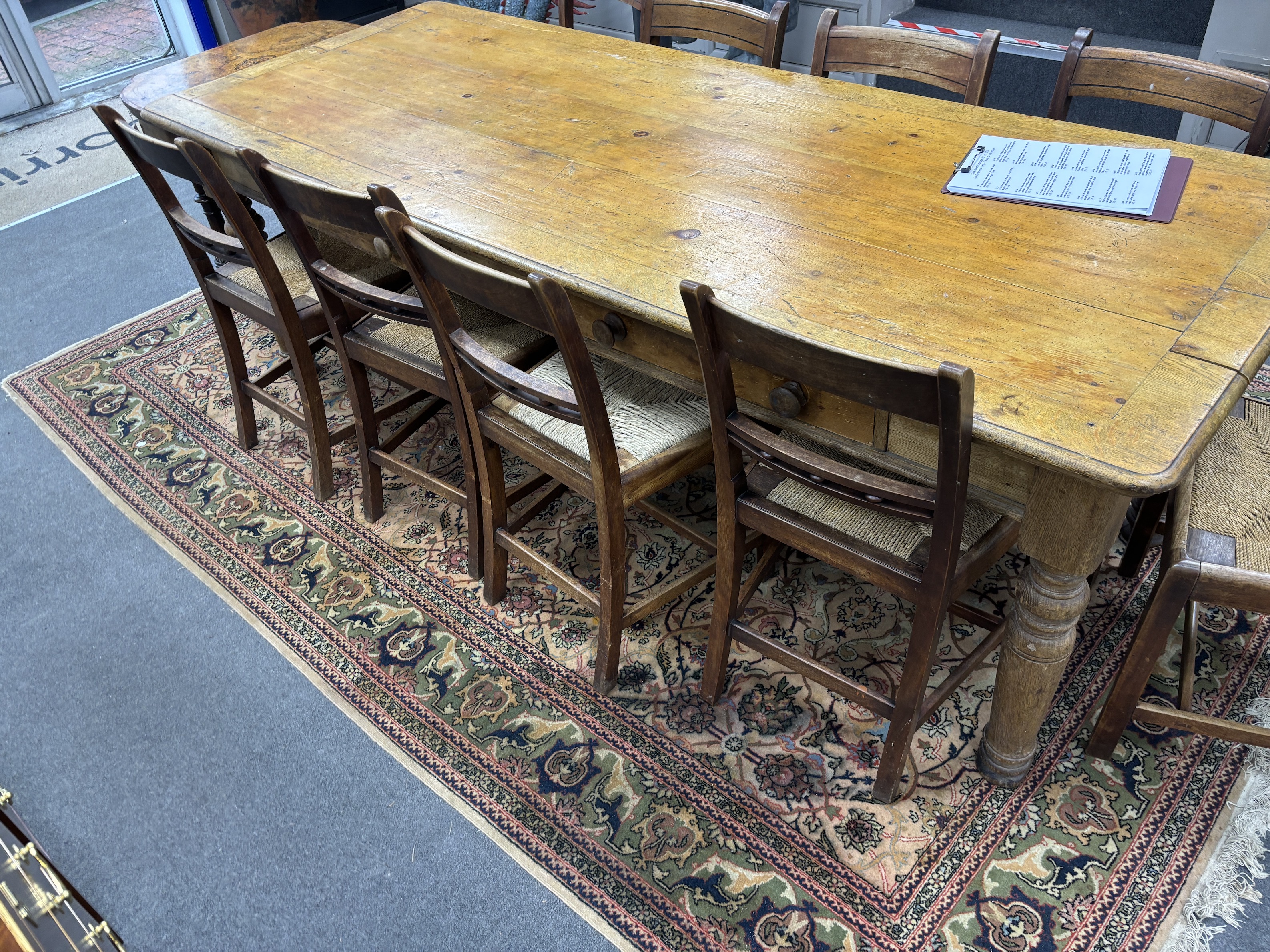 A set of nine early 19th century Provincial mahogany rush seat dining chairs, width 47cm, depth 38cm, height 86cm